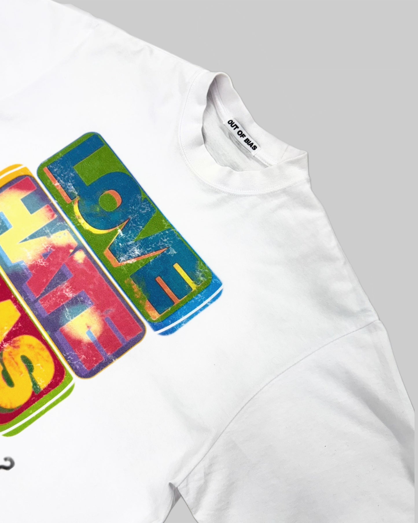 Out of Bias clothing brand “Unbiased” t-shirt that features Out of Bias clothing brand motto