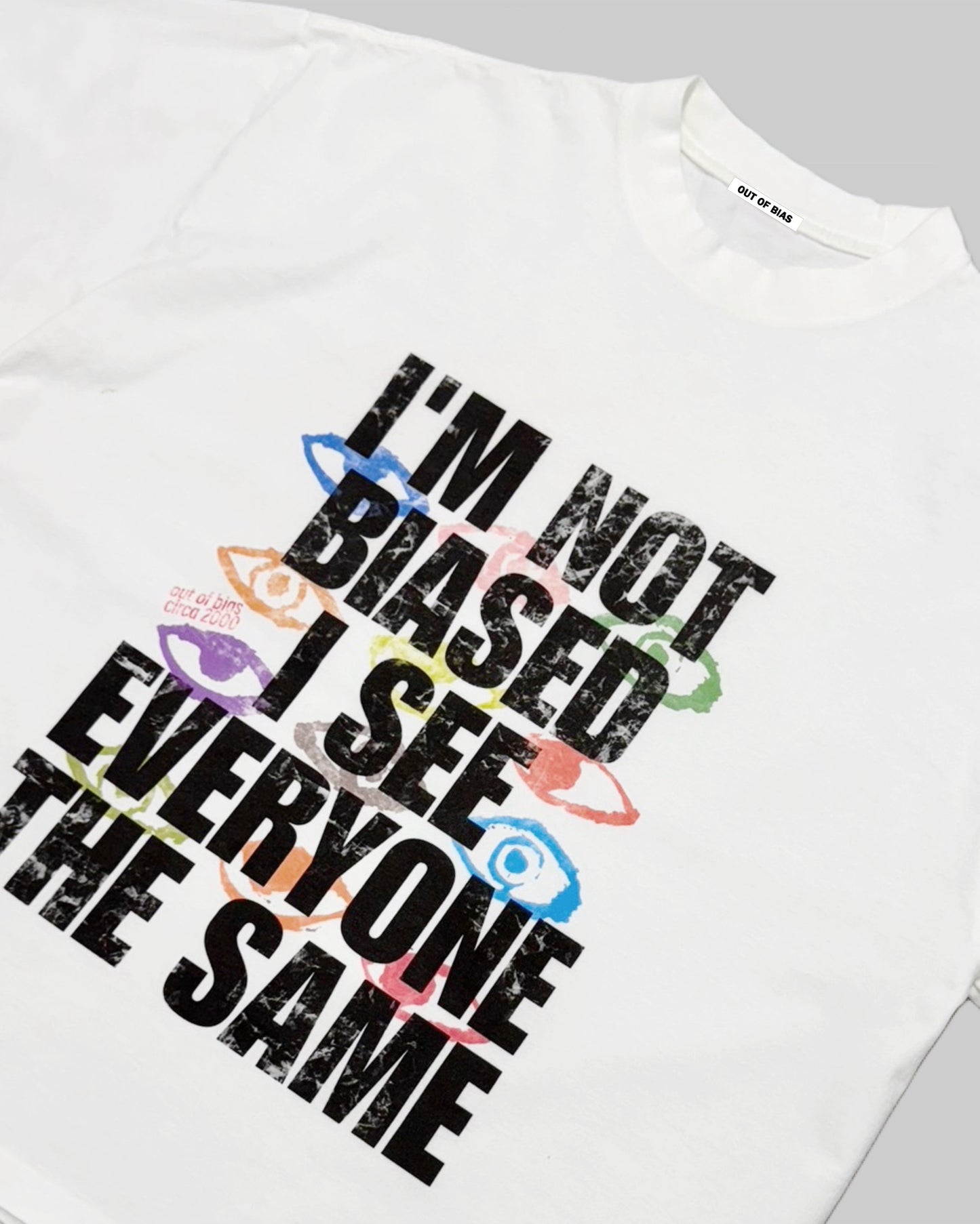 Out of Bias clothing brand “Unbiased” t-shirt that features Out of Bias clothing brand motto